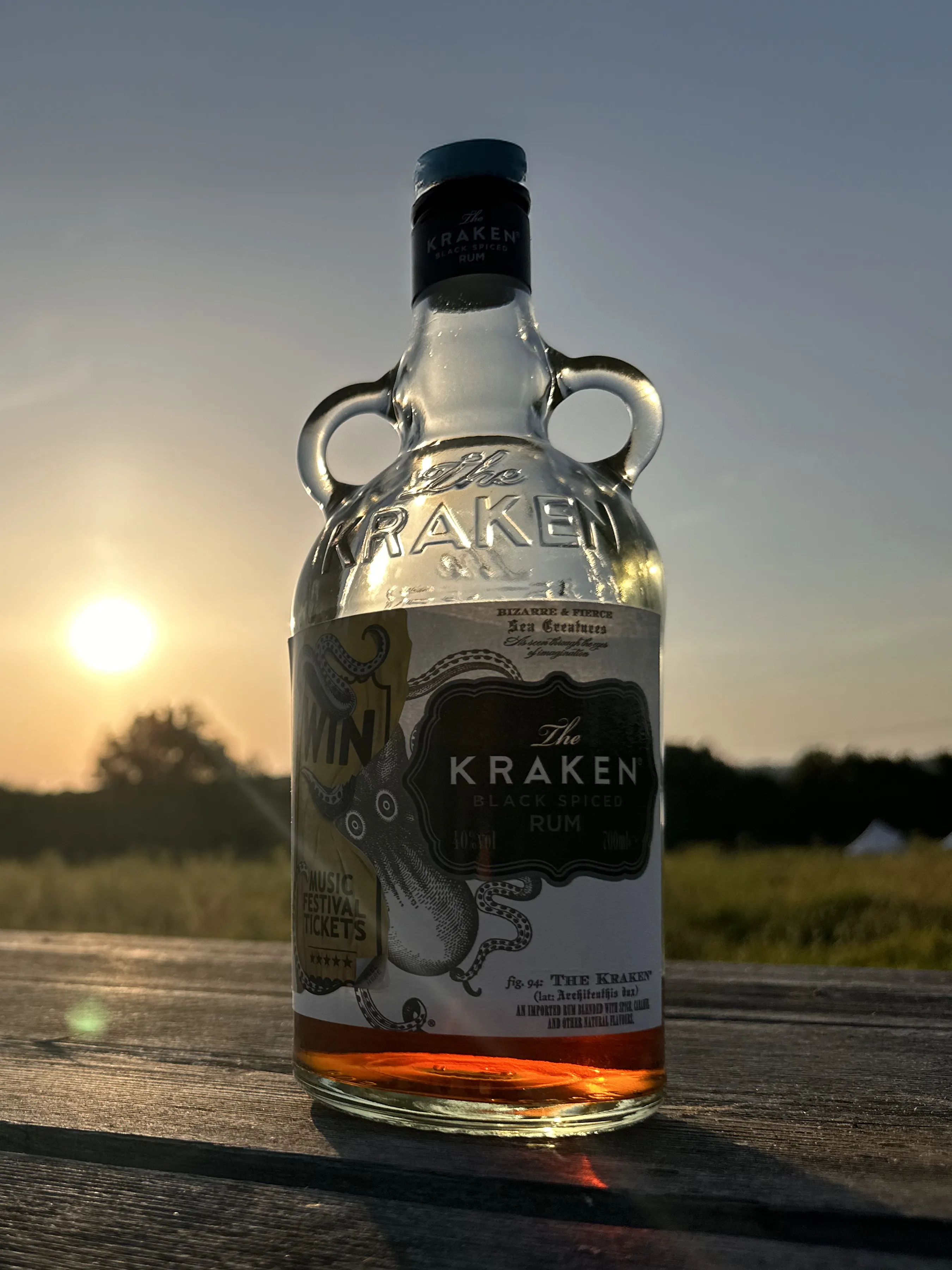 A bottle catching the light at sunset