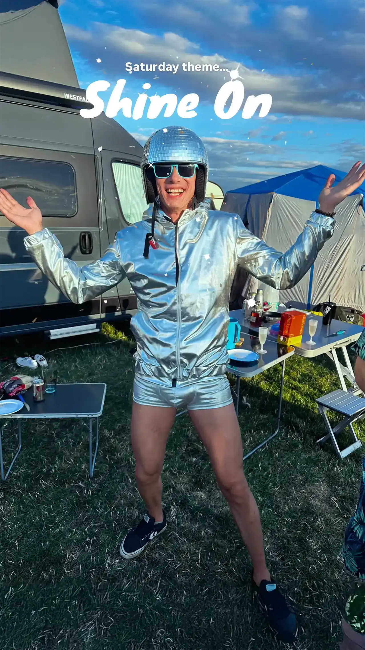 A man wearing a shiny helmet